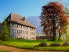 Le Château des Allues et son hêtre pourpre au printemps Le Château des Allues et son hêtre pourpre au printemps