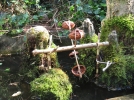 Un petit moulin  eau dans son jardin